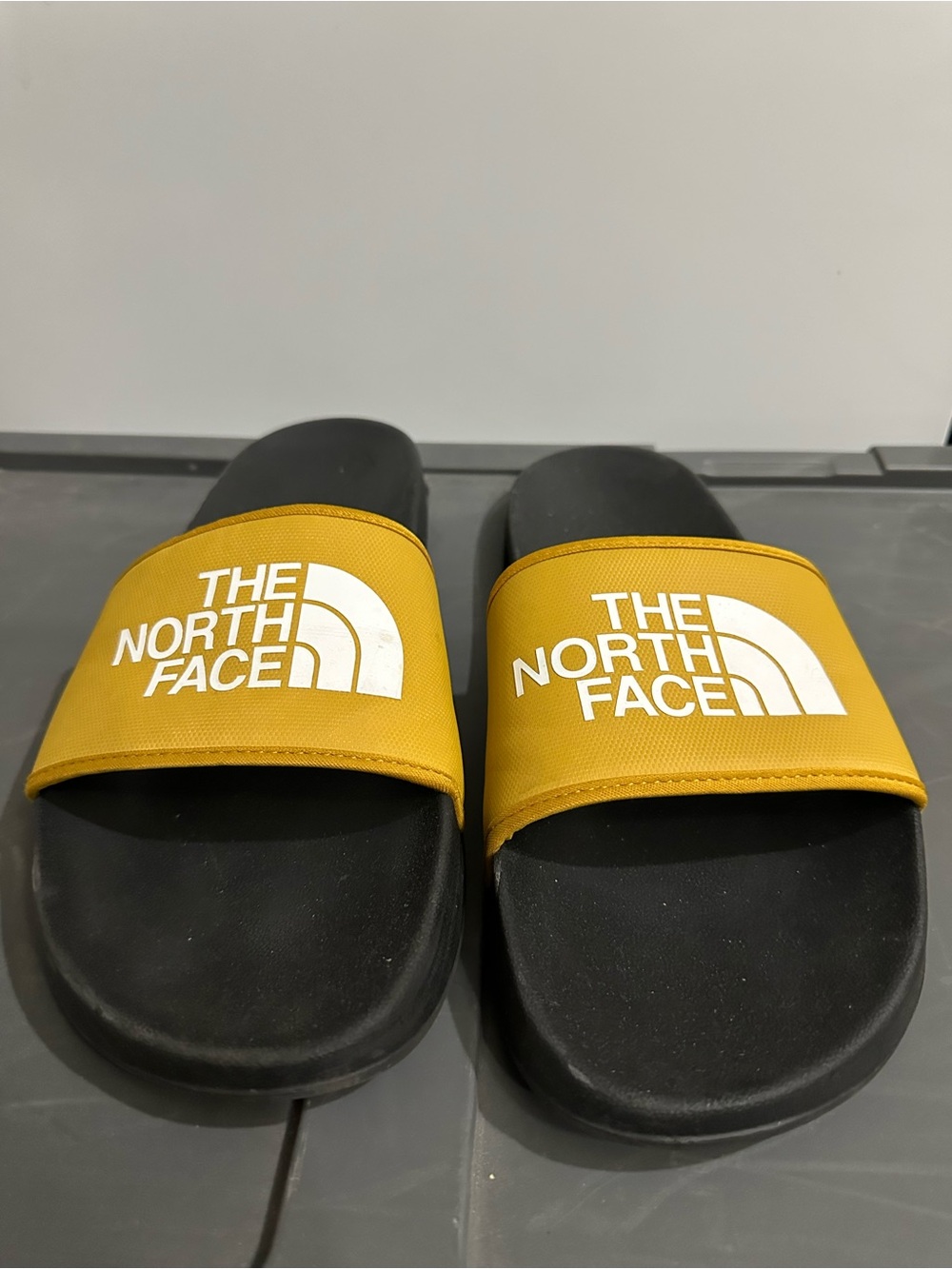 The North Face Yellow and Black Slides / Sandals size 13